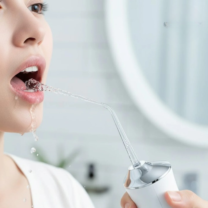 Wasserstrahlgerät für gründliche Mundpflege | Flexibel einstellbare Reinigungsmodi | Austauschbare Düsen