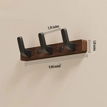 Minimalistischer Wandgarderobenhaken aus Holz und Metall