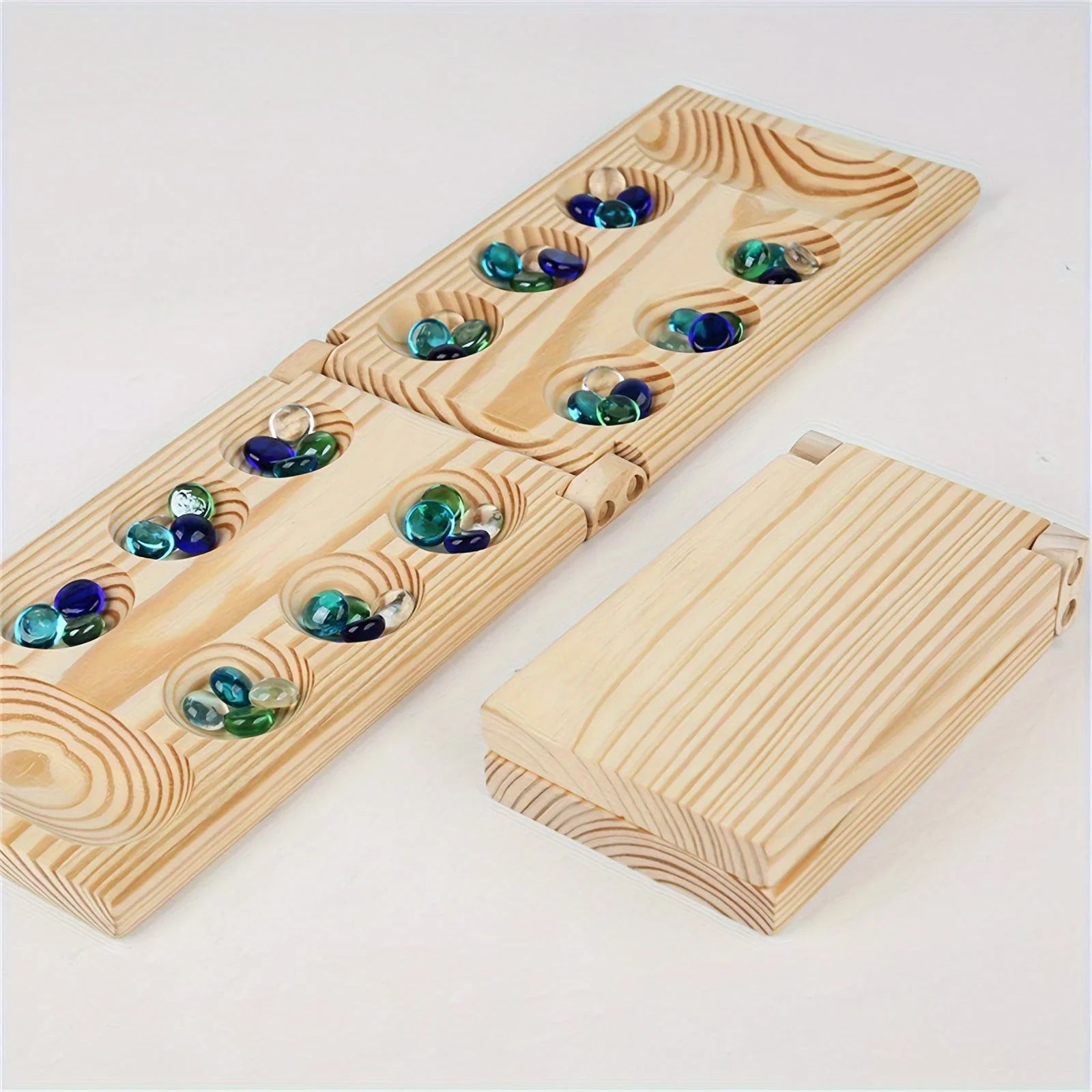 Brettspiel Mancala – Strategiespiel für zwei Spieler
