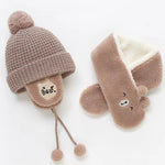 Wintermütze für Babys mit Ohrenschutz und passendem Schal