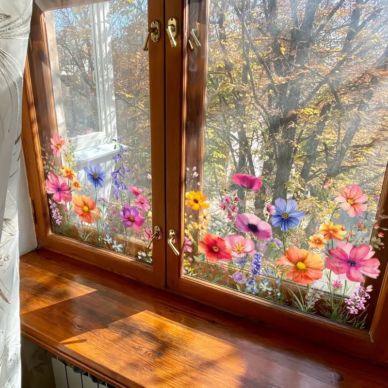 Bunte Fensteraufkleber mit Blumen- und Schmetterlingsmotiven