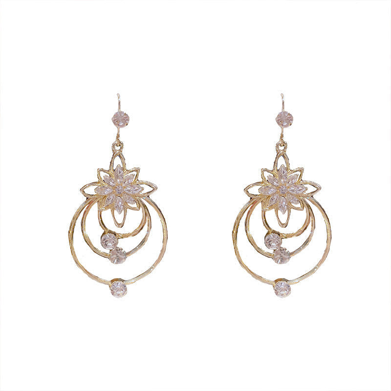 Drei-Ringe Ohrringe mit Kristall-Lotus