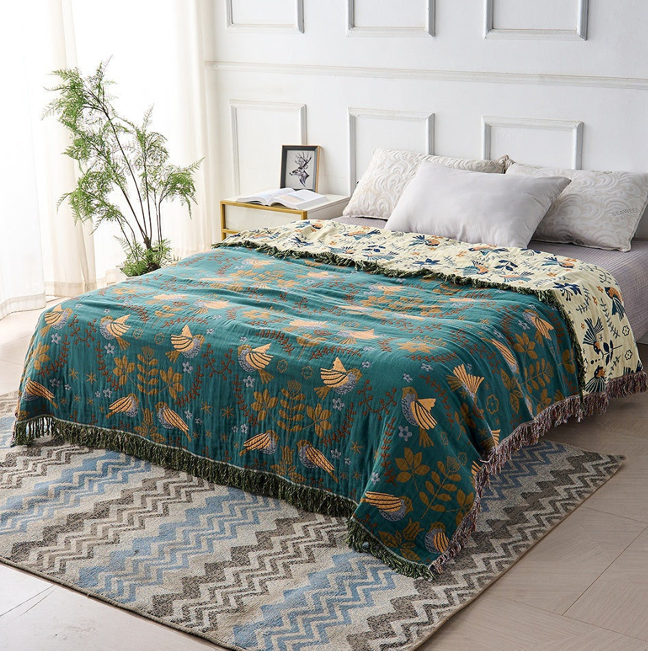 Wendbare skandinavische Decke mit Vogelmotiven | 100% Baumwolle
