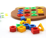 Formensortierspiel nach Montessori-Prinzipien