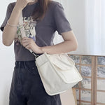 UrbanEase Canvas Umhängetasche – Weiße Schultertasche mit Magnetverschluss und verstellbarem Gurt