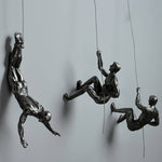 Kletterfiguren Wanddekoration – Inspirierende Wandkunst aus Resin und Eisen