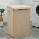 Stylish laundry hamper made of natural materials with lid