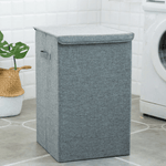 Stylish laundry hamper made of natural materials with lid