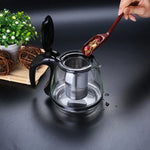 Glas Teekanne mit kreativem Design für Teeblumen und abnehmbarem Stahlfilter