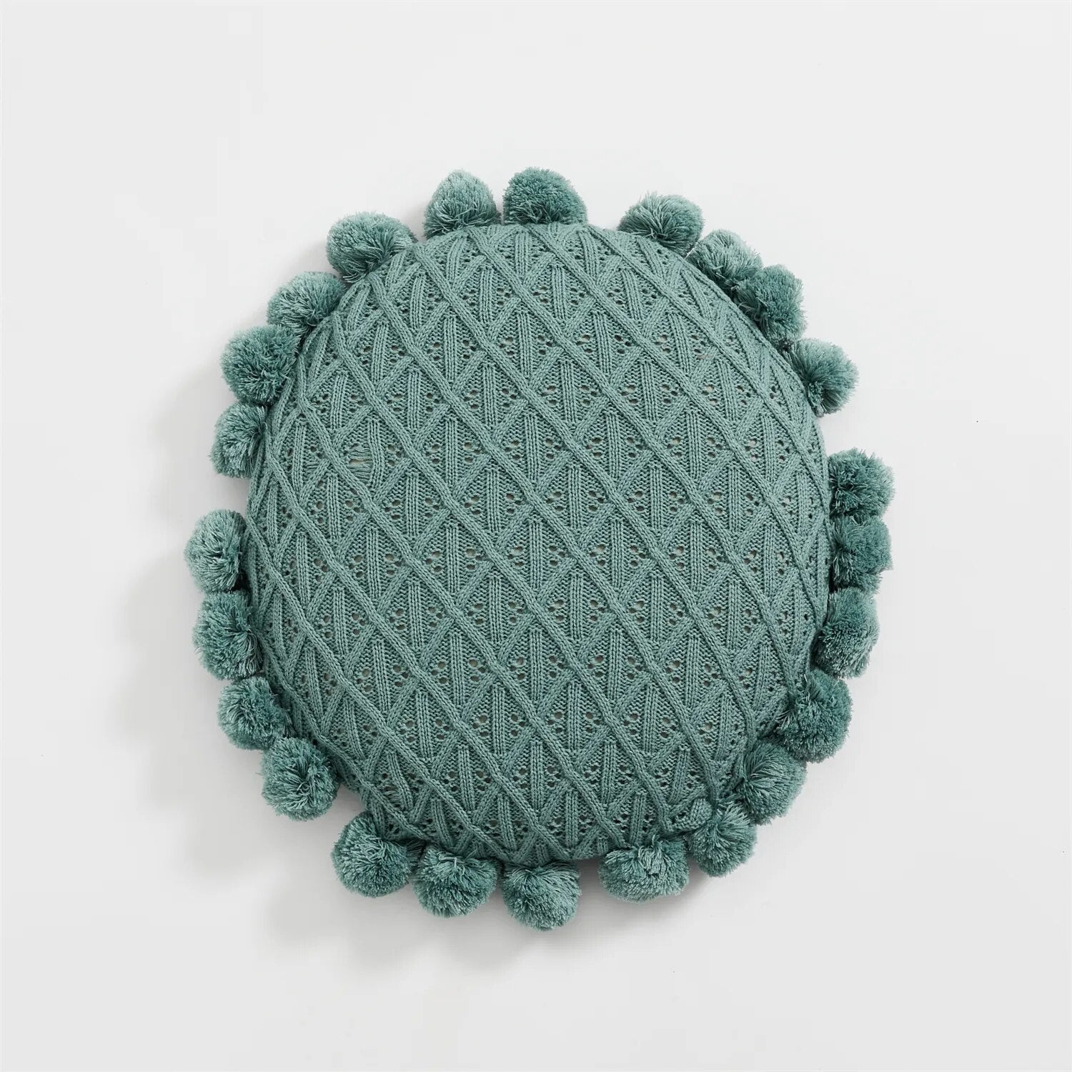 Runder Kuschelkissen mit Pompom und Quaste aus Acrylstrick