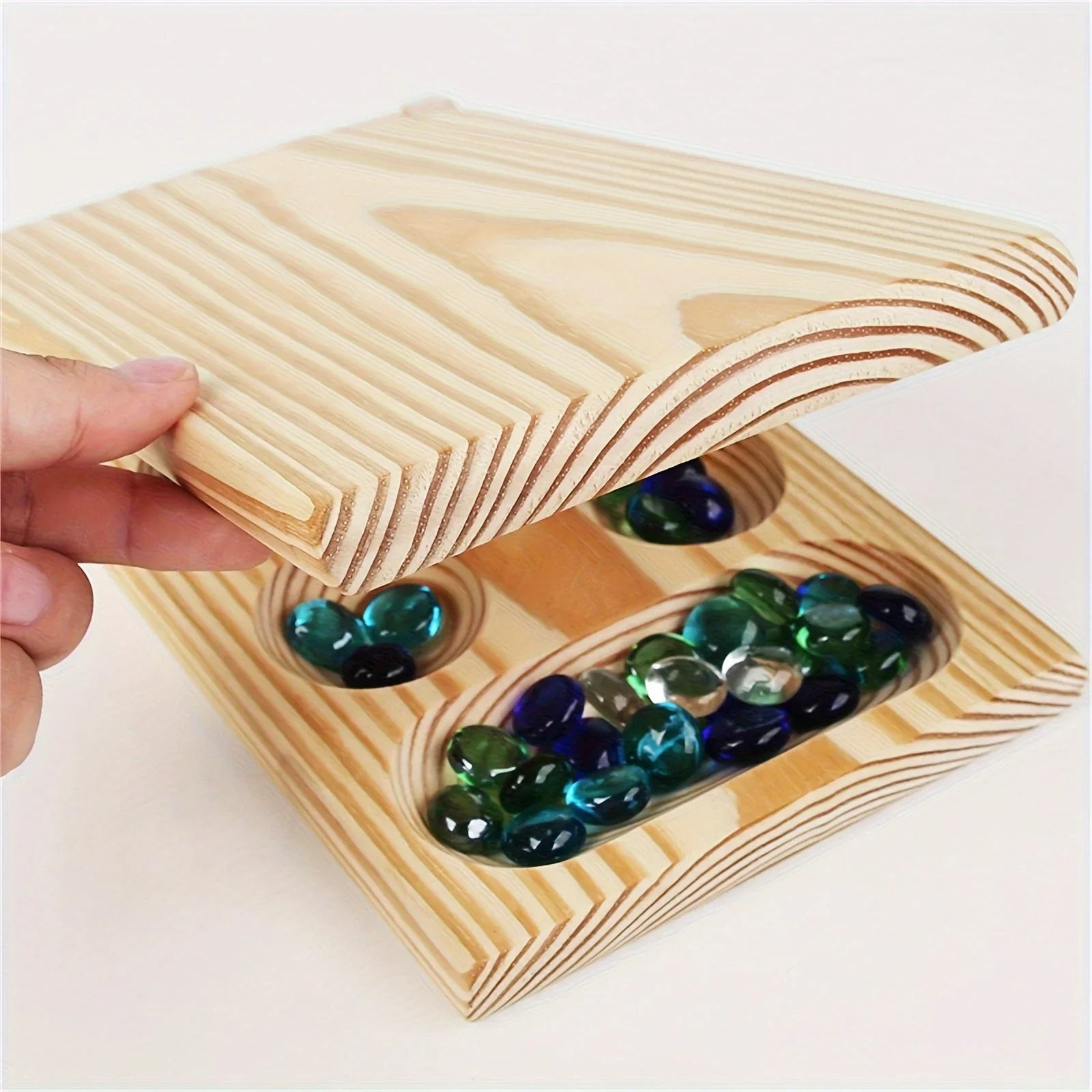 Brettspiel Mancala – Strategiespiel für zwei Spieler