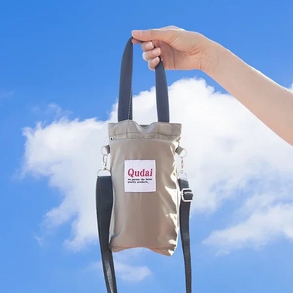 Vielseitige Schultertasche mit Getränkehalter