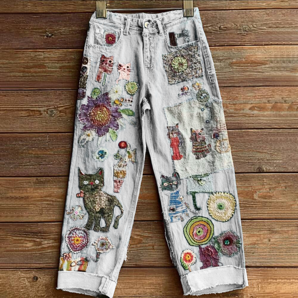 Elegant women's jeans in a bohemian style with a floral motif