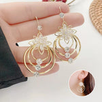 Drei-Ringe Ohrringe mit Kristall-Lotus