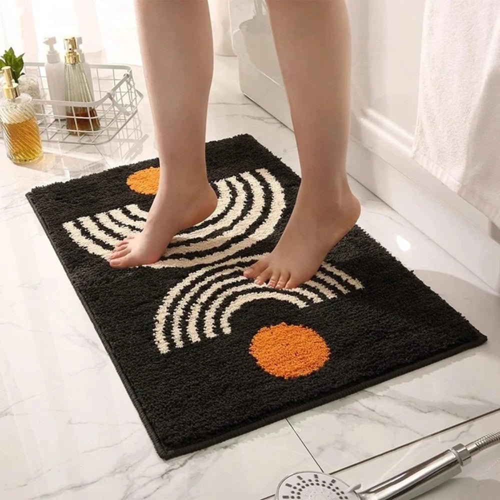 Elegante rutschfeste Badematte im Sonnenaufgangsdesign