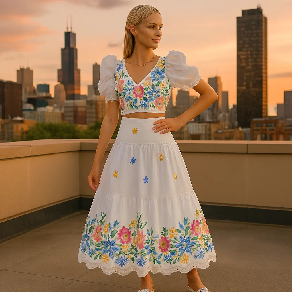 Elegantes Blumendesign: Zweiteiliges Set mit Puffärmeln und Rüschensrock