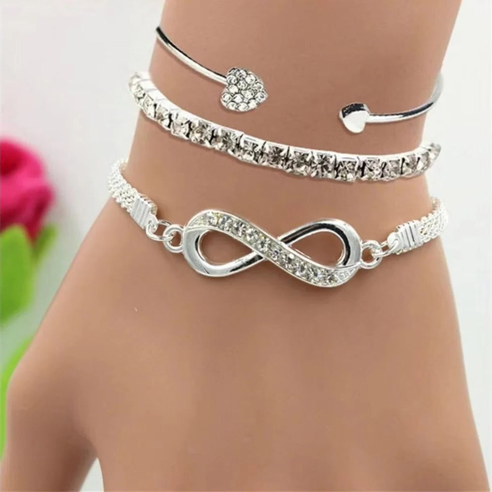 Glitzerndes Armband-Set mit Herz- und Unendlichkeitssymbolen