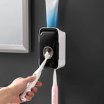 Wandmontierter Zahnpasta-Spender mit Klebeinstallation