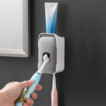 Wandmontierter Zahnpasta-Spender mit Klebeinstallation
