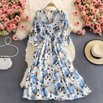 Leichtes Sommerkleid aus Chiffon mit V-Ausschnitt und Puffärmeln