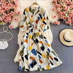 Leichtes Sommerkleid aus Chiffon mit V-Ausschnitt und Puffärmeln