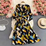 Leichtes Sommerkleid aus Chiffon mit V-Ausschnitt und Puffärmeln