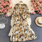 Leichtes Sommerkleid aus Chiffon mit V-Ausschnitt und Puffärmeln