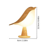 Stimmungsvolle Tischlampe im Vogeldesign mit Farbwechsel