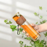 Tragbare Glaskaraffe mit Teefilter und isolierter Hülle
