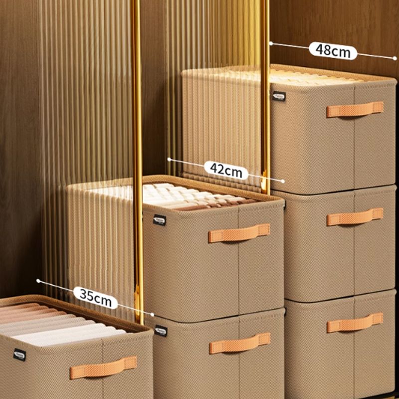 Kompakte Aufbewahrungsbox aus Stoff mit stabilen Griffen
