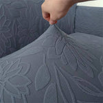 Elegante Sofahusse mit Sonnenblumen-Muster und langem Saum