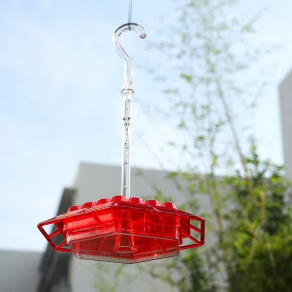 Schwebender Kolibri-Futterspender mit Insektenschutz
