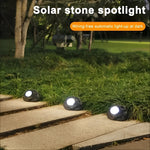 Solarbetriebene LED-Gartenleuchte im Stein-Design mit Lichtsensor