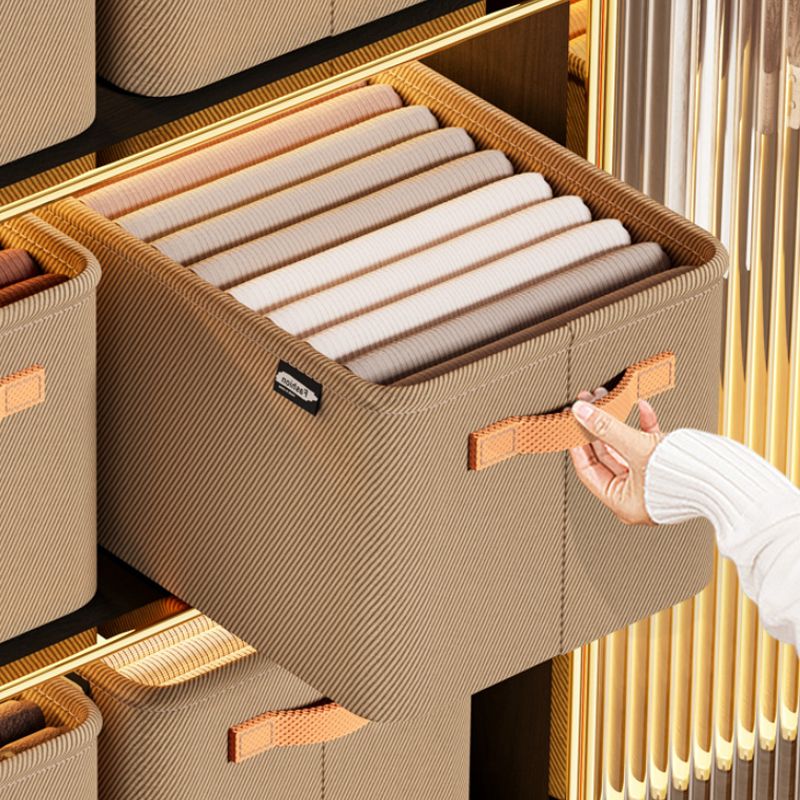 Kompakte Aufbewahrungsbox aus Stoff mit stabilen Griffen
