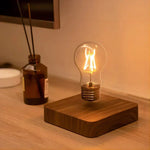 Floating Light Bulb on Walnut Stand for Home Decoration