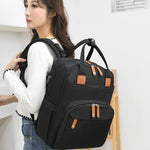 Practical baby backpack with fold-out changing mat – 2-in-1