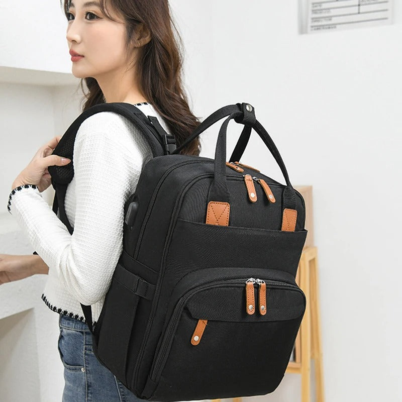 Practical baby backpack with fold-out changing mat – 2-in-1