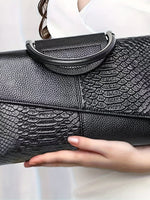 Stylish shoulder bag in elegant crocodile pattern