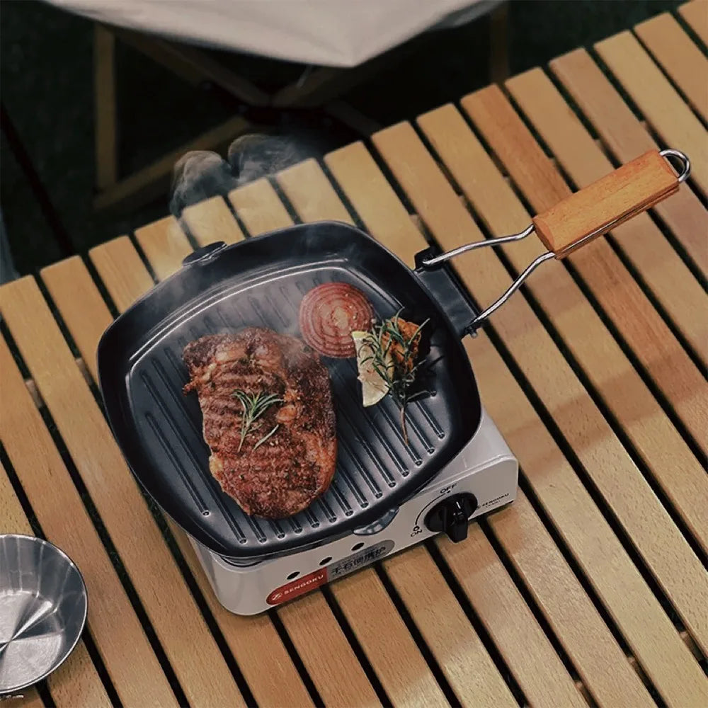 Faltbare Gusseisen-Grillpfanne mit Holzgriff für leckere Grillgerichte