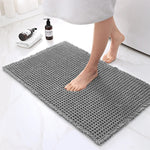 Elegant bathroom mat with non-slip backing and waffle design