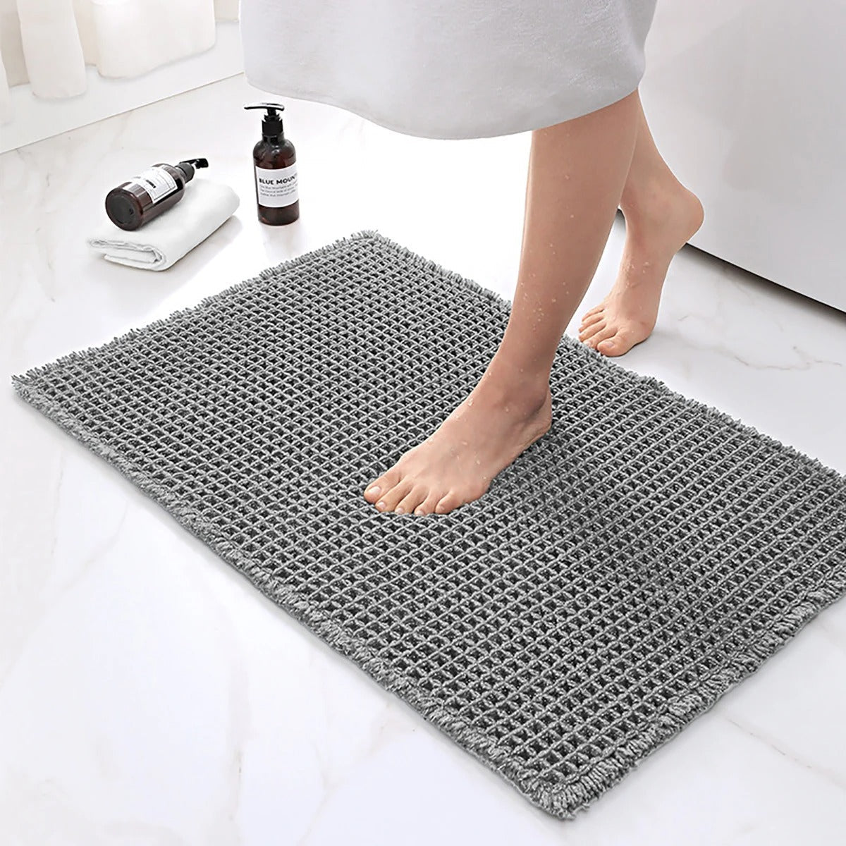 Elegant bathroom mat with non-slip backing and waffle design