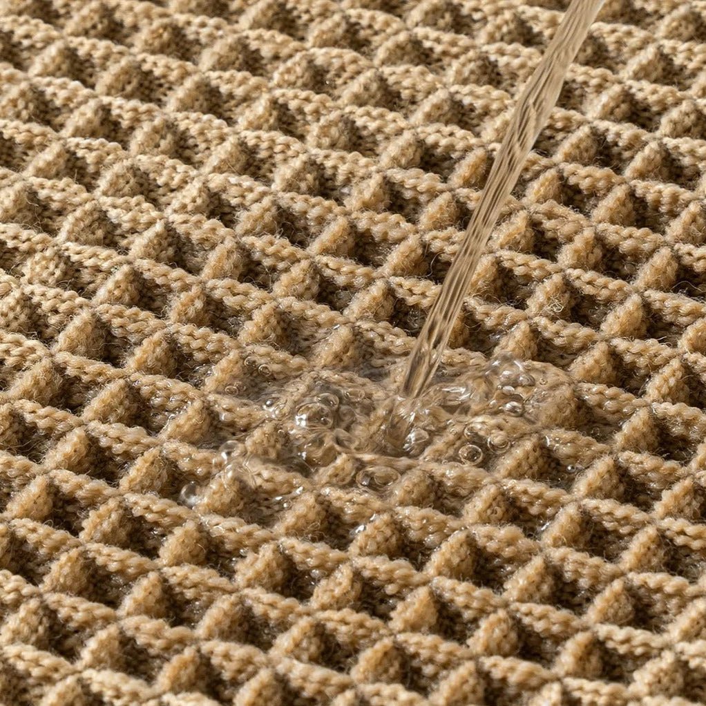 Elegant bathroom mat with non-slip backing and waffle design