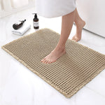 Elegant bathroom mat with non-slip backing and waffle design