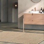 Elegant bathroom mat with non-slip backing and waffle design