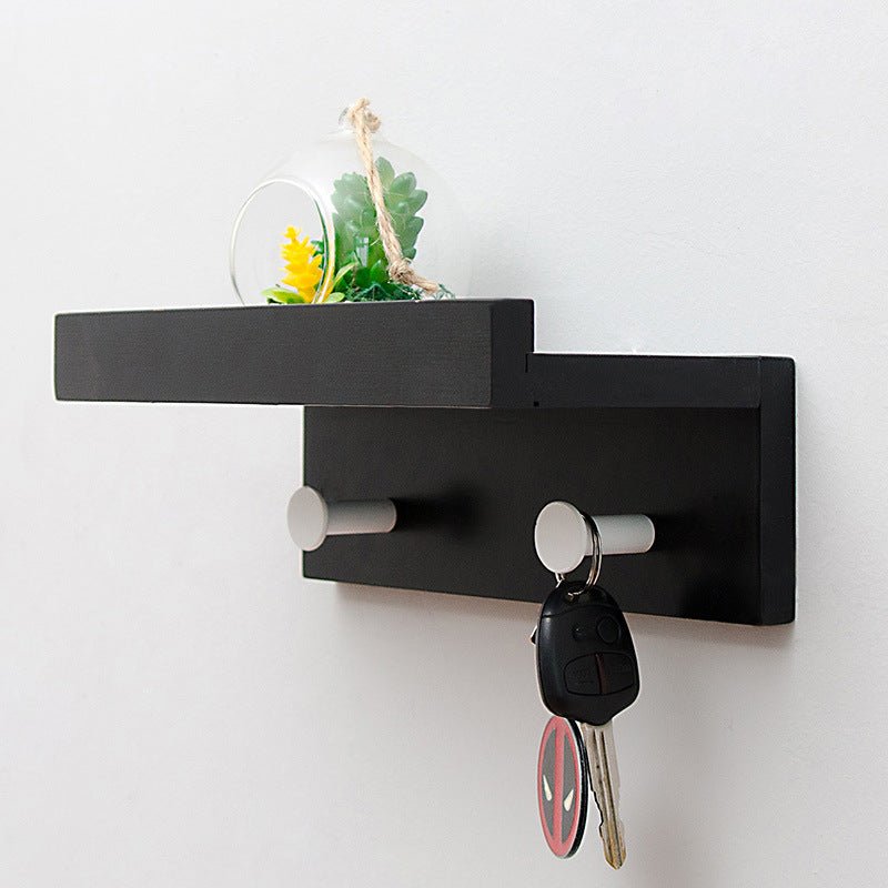 Elegant Wall Shelf with Hooks for Optimal Storage Space