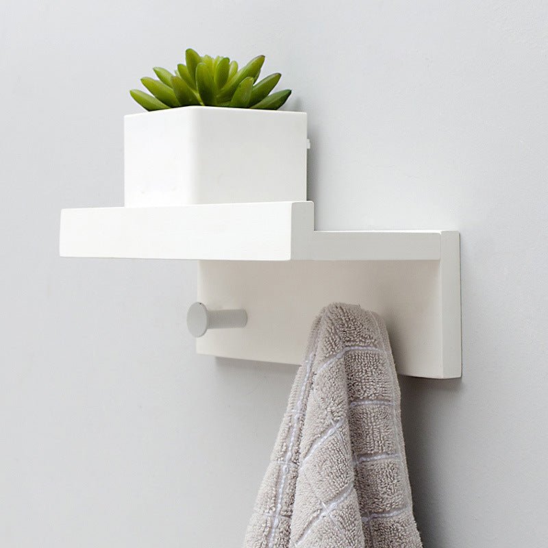 Elegant Wall Shelf with Hooks for Optimal Storage Space