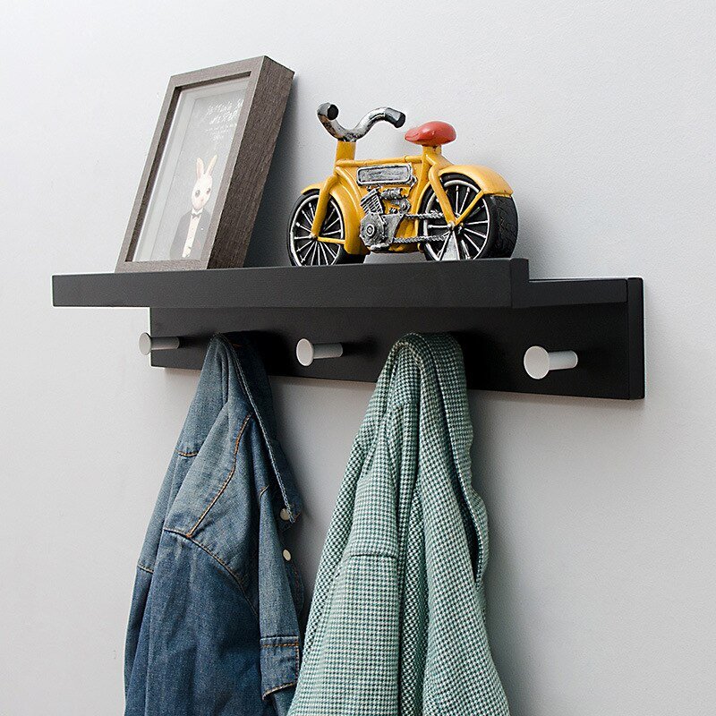 Elegant Wall Shelf with Hooks for Optimal Storage Space