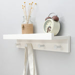 Elegant Wall Shelf with Hooks for Optimal Storage Space