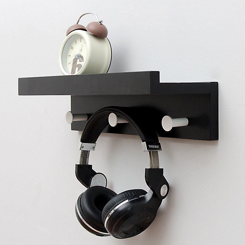 Elegant Wall Shelf with Hooks for Optimal Storage Space