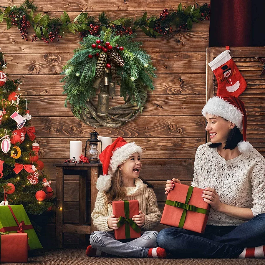 Handgemachter Boho Türkranz mit Glocken und Tannenzapfen – Winterkranz